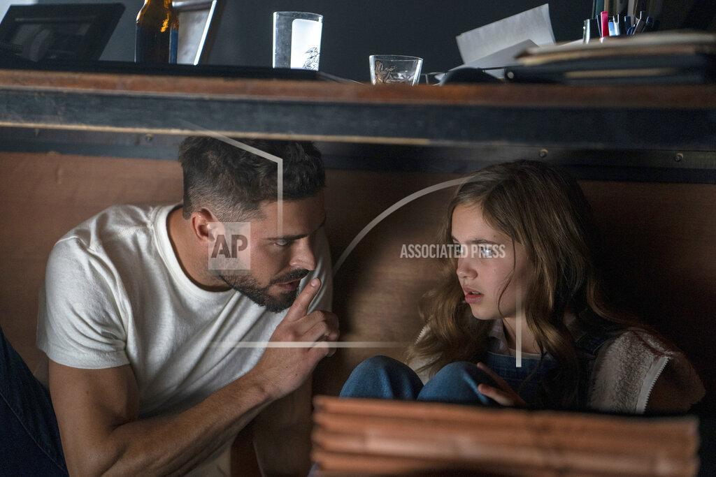 Ken Woroner This image released by Universal Pictures shows Zac Efron, left, and Ryan Kiera Armstrong in a scene from "Firestarter." (Ken Woroner/Universal Pictures via AP)