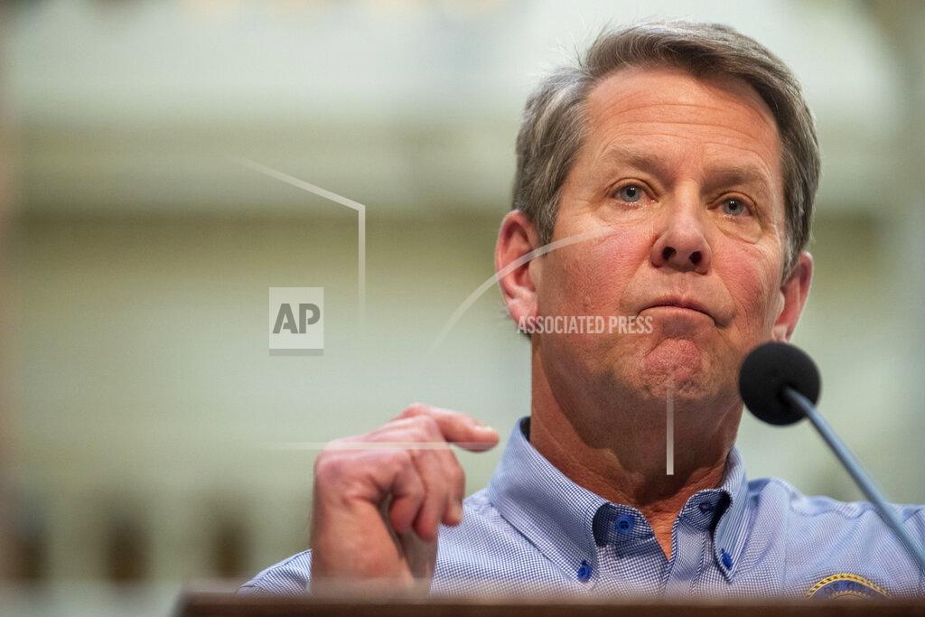 Georgia Gov. Brian Kemp speaks during a news conference at the Capitol building in Atlanta, Monday, April 27, 2020, during the coronavirus outbreak. Kemp did not say whether he would extend the shelter-in-place order that is set to expire at midnight Thursday. (Alyssa Pointer/Atlanta Journal-Constitution via AP)