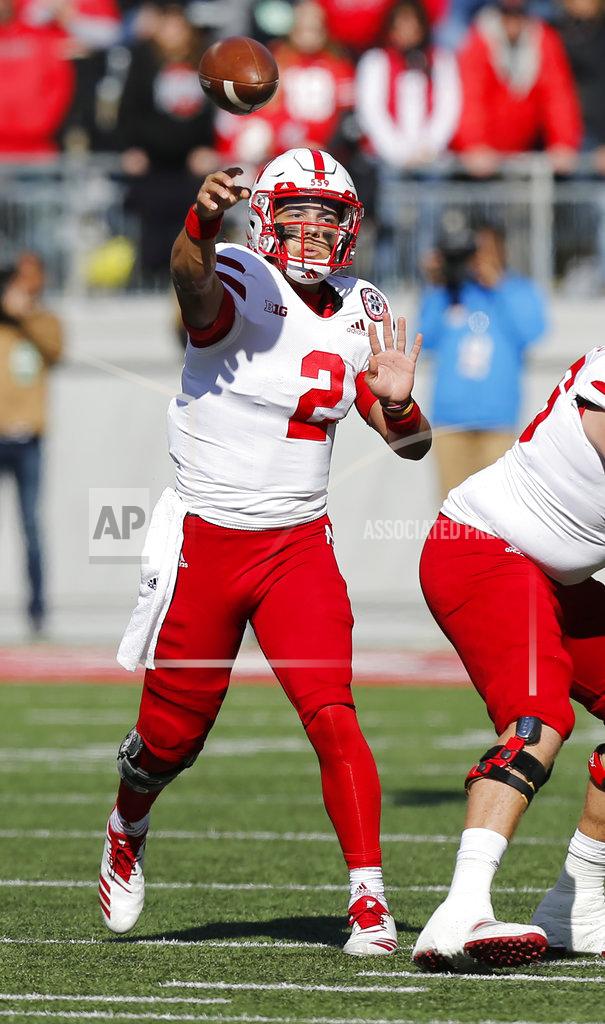 Jay Laprete Nebraska quarterback Adrian Martinez throws a pass against Ohio State during the first half of an NCAA college football game Saturday, Nov. 3, 2018, in Columbus, Ohio. (AP Photo/Jay LaPrete)