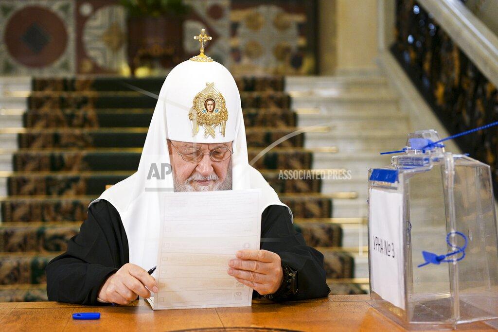 Oleg Varov In this photo released by Russian Orthodox Church Press Service, Russian Orthodox Church Patriarch Kirill reads his ballot during the Parliamentary elections in Moscow, Russia, Friday, Sept. 17, 2021. Russia has begun three days of voting for a new parliament that is unlikely to change the country's political complexion. There's no expectation that United Russia, the party devoted to President Vladimir Putin, will lose its dominance in the State Duma. (Oleg Varov/Russian Orthodox Church Press Service via AP)