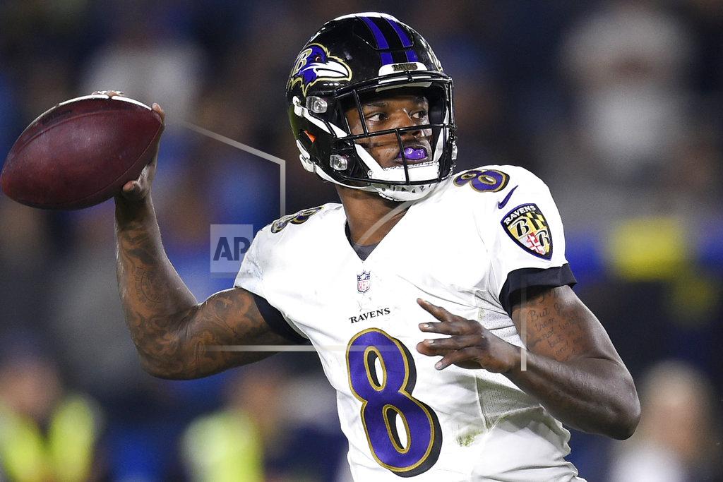Kelvin Kuo FILE - In this Saturday, Dec. 22, 2018 file photo, Baltimore Ravens quarterback Lamar Jackson passes against the Los Angeles Chargers during the first half in an NFL football game in Carson, Calif. The Ravens are making their first postseason appearance since 2014. (AP Photo/Kelvin Kuo, File)