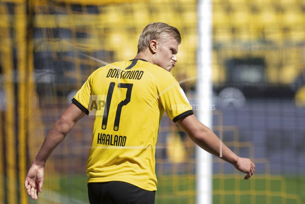 Bernd Thissen Dortmund's Erling Haaland reacts during the German Bundesliga soccer match between Borussia Dortmund and 1899 Hoffenheim in Dortmund, Germany, Saturday, June 27, 2020. (Bernd Thissen/DPA via AP, Pool)