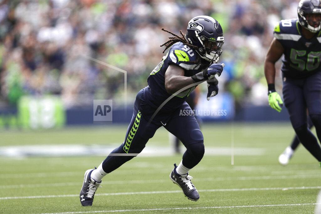 Stephen Brashear Seattle Seahawks defensive end Jadeveon Clowney runs during the first half of an NFL football game against the Cincinnati Bengals, Sunday, Sept. 8, 2019, in Seattle. (AP Photo/Stephen Brashear)