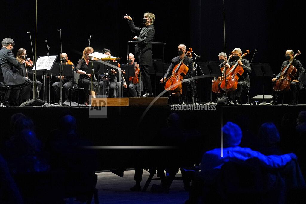 Kathy Willens CORRECTS SPELLING OF FIRST NAME TO ESA INSTEAD OF ESSA - Guest conductor Esa-Pekka Salonen, music director of the San Francisco Symphony and principal conductor of London's Philharmonia Orchestra, leads the New York Philharmonic as the group performed together before a live audience of 150 people for the first time since March 10, 2020, at The Shed in Hudson Yards, Wednesday, April 14, 2021, in New York. (AP Photo/Kathy Willens)