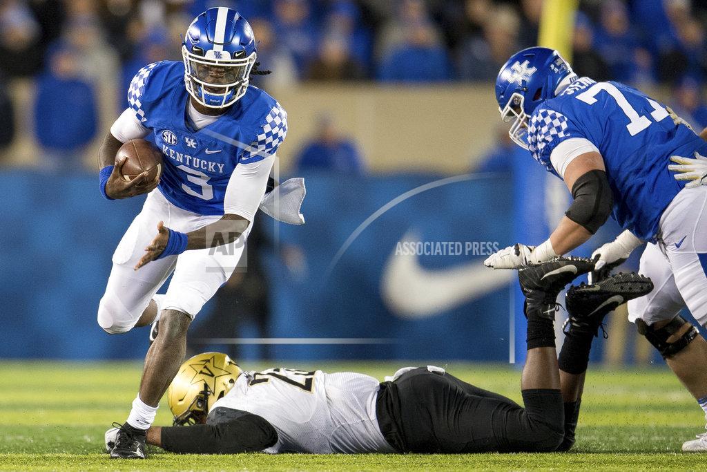 Bryan Woolston Kentucky quarterback Terry Wilson (3) runs with the ball during the second half of an NCAA college football game against Vanderbilt in Lexington, Ky., Saturday, Oct. 20, 2018. Kentucky won, 14-7. (AP Photo/Bryan Woolston)