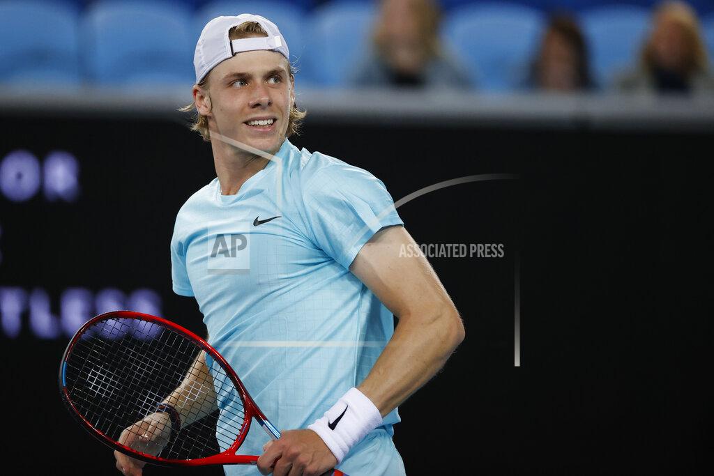 Rick Rycroft Canada's Denis Shapovalov smiles after winning a point against Italy's Jannik Sinner during the first round match at the Australian Open tennis championship in Melbourne, Australia, Monday, Feb. 8, 2021. (AP Photo/Rick Rycroft)
