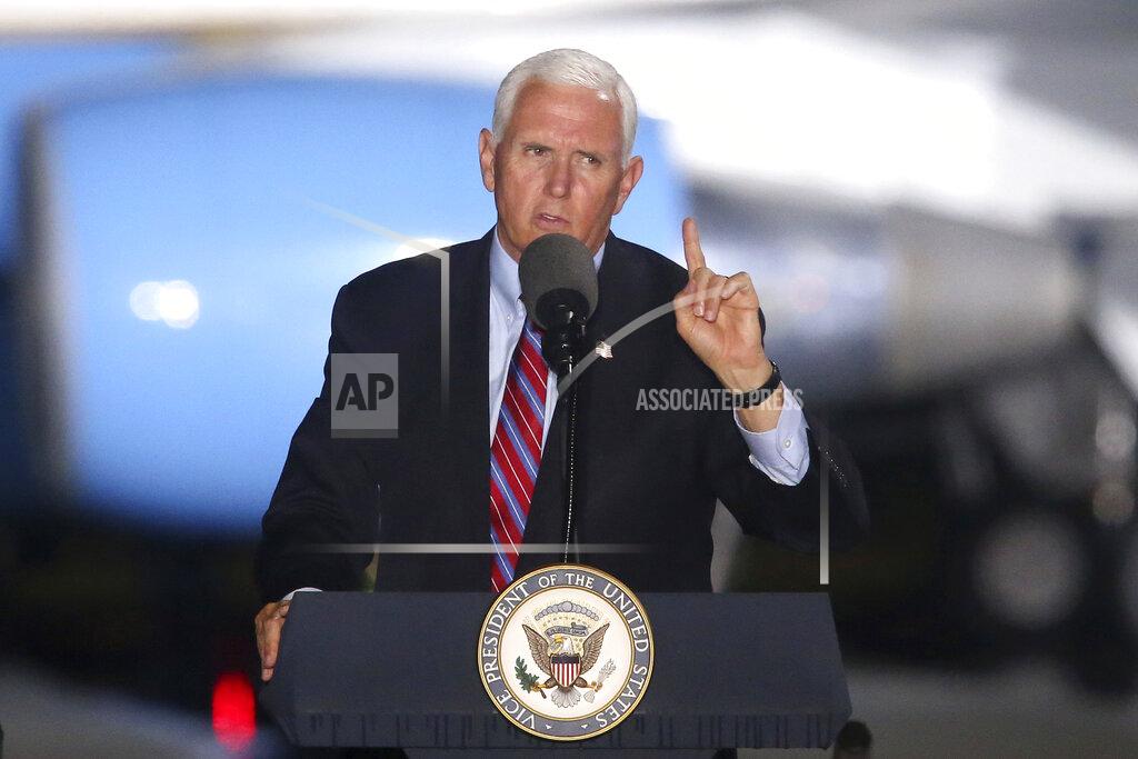 Steve Cannon Vice President Mike Pence speaks to supporters Saturday Oct. 24, 2020 in Tallahassee, Fla. Battleground Florida was again a central focus of the presidential campaign Saturday as President Donald Trump, Vice President Mike Pence and former President Barack Obama all had high-profile events in the state. (AP Photo/Steve Cannon)