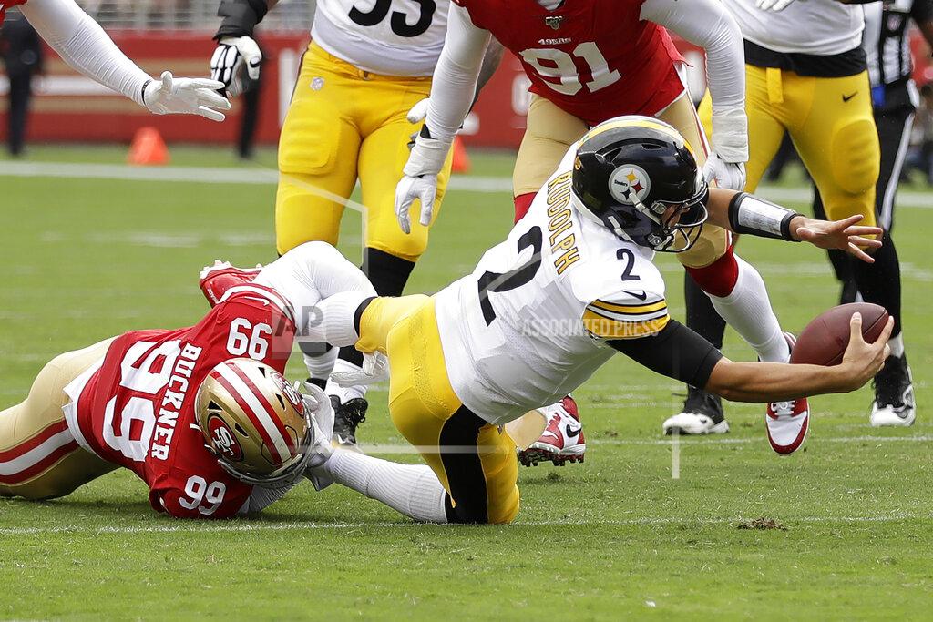 Ben Margot Pittsburgh Steelers quarterback Mason Rudolph (2) is tackled by San Francisco 49ers defensive tackle DeForest Buckner (99) during the first half of an NFL football game in Santa Clara, Calif., Sunday, Sept. 22, 2019. (AP Photo/Ben Margot)