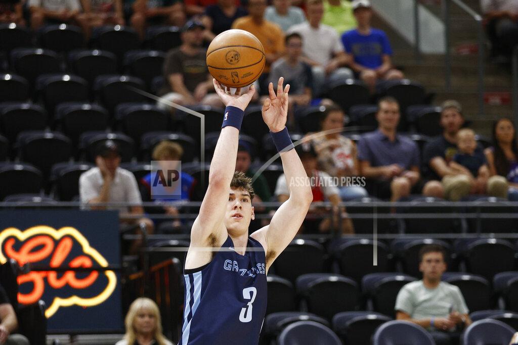 Jeff Swinger Memphis Grizzlies forward Jake LaRavia shoots a 3-pointer against the Philadelphia 76ers during the first quarter of an NBA summer league basketball game Tuesday, July 5, 2022, in Salt Lake City. (AP Photo/Jeff Swinger)
