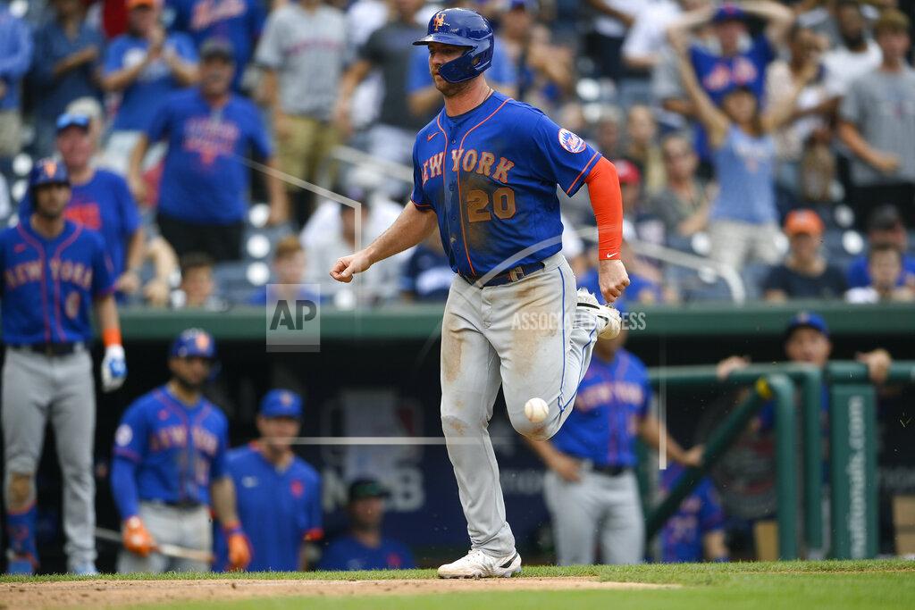 Nick Wass New York Mets' Pete Alonso runs home to score on a single by Michael Conforto during the ninth inning of a baseball game against the Washington Nationals, Sunday, Sept. 5, 2021, in Washington. (AP Photo/Nick Wass)