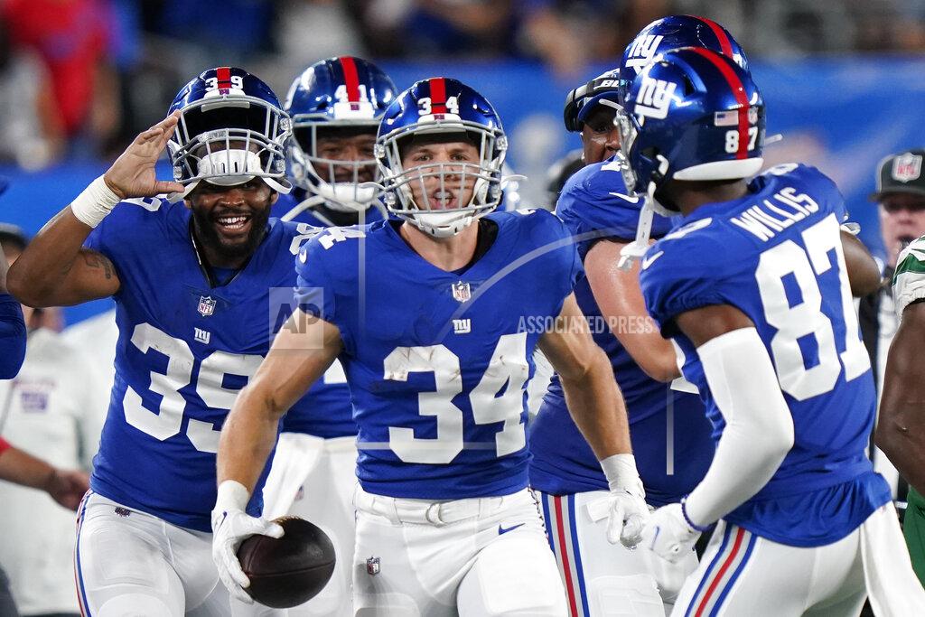 Corey Sipkin New York Giants running back Sandro Platzgummer (34) reacts after a running play in the second half of an NFL preseason football game against the New York Jets, Saturday, Aug. 14, 2021, in East Rutherford, N.J. (AP Photo/Corey Sipkin)