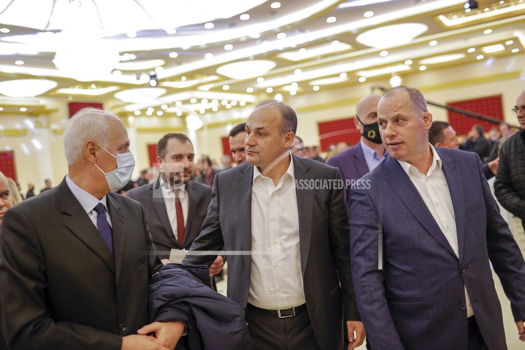 Visar Kryeziu Enver Hoxhaj, candidate for prime minister of the Democratic Party of Kosovo (PDK), center, attends an electoral rally near the town of Drenas, Kosovo, on Monday, Feb. 8, 2021. Kosovo holds an early general election on upcoming Sunday Feb. 14, amid the coronavirus pandemic, economic downturn and stalled negotiations with wartime foe Serbia. (AP Photo/Visar Kryeziu)