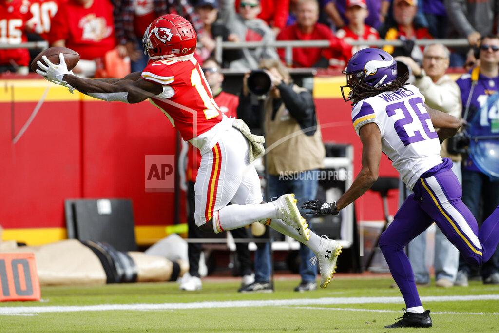 Colin E. Braley Kansas City Chiefs wide receiver Tyreek Hill (10) catches a 40-yard touchdown pass in front of Minnesota Vikings cornerback Trae Waynes (26) during the first half of an NFL football game in Kansas City, Mo., Sunday, Nov. 3, 2019. (AP Photo/Colin E. Braley)