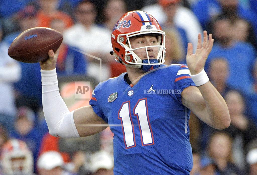 Phelan M. Ebenhack FILE - In this Nov. 3, 2018, file photo, Florida quarterback Kyle Trask throws a pass during the second half of an NCAA college football game against Missouri in Gainesville, Fla. The father of Florida quarterback Kyle Trask says his son is out for the season because of a broken foot. Michael Trask posted on Facebook that Kyle fractured a foot practicing a trick play Wednesday, Nov. 7, 2018. (AP Photo/Phelan M. Ebenhack)
