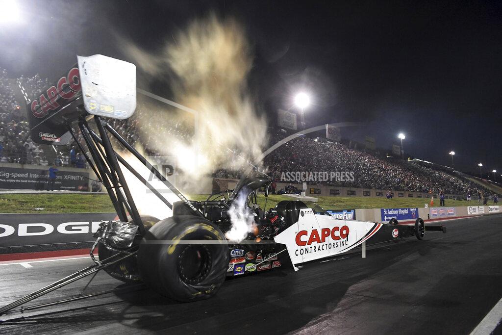 Jerry Foss In this photo provided by the NHRA, Steve Torrence drives in Top Fuel qualifying Friday, July 19, 2019, for the Dodge Mile-High NHRA Nationals drag races at Bandimere Speedway in Morrison, Colo. (Jerry Foss/NHRA via AP)