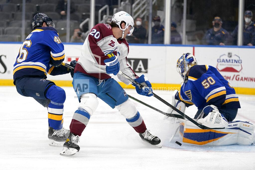 Jeff Roberson Colorado Avalanche's Brandon Saad (20) is unable to score past St. Louis Blues goaltender Jordan Binnington (50) and Jake Walman (46) during the third period of an NHL hockey game Thursday, April 22, 2021, in St. Louis. (AP Photo/Jeff Roberson)