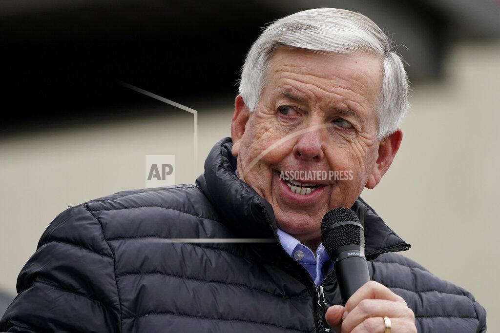 Charlie Riedel FILE - Missouri Republican Gov. Mike Parson speaks during a campaign rally at a gun store Sunday, Oct. 25, 2020, in Lees Summit, Mo. Parson on Thursday, Nov. 12, 2020 announced a change in guidance for when K-12 students and staff should quarantine. The change states that if the person diagnosed with COVID-19 and the person exposed are both wearing face coverings, the exposed person does not need to quarantine. (AP Photo/Charlie Riedel,File)