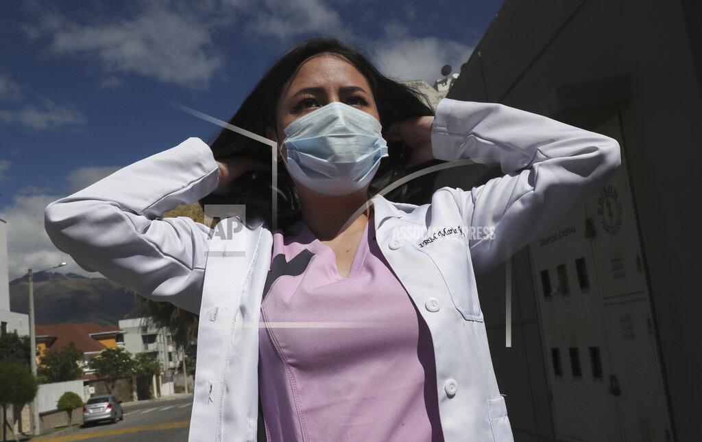 Dolores Ochoa Dr. Maria Jose Casco adjusts her hair as she walks near her home in Quito, Ecuador, Wednesday, Aug. 5, 2020. Around the world, young people armed with new degrees, diplomas and professional qualifications are struggling to enter the workforce as the pandemic pushes the global economy into recession. Maria Jose Casco, a newly qualified doctor, hasn’t found work after graduating in Ecuador in April. Casco, 24, said she’s been searching for health-related jobs as well as work in other industries. (AP Photo/Dolores Ochoa)