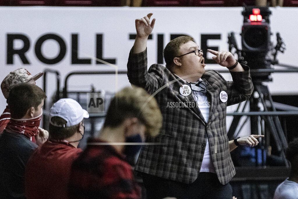 Vasha Hunt Alabama fans cheer against Kentucky during the second half of an NCAA college basketball game, Tuesday, Jan. 26, 2021, in Tuscaloosa, Ala. (AP Photo/Vasha Hunt)