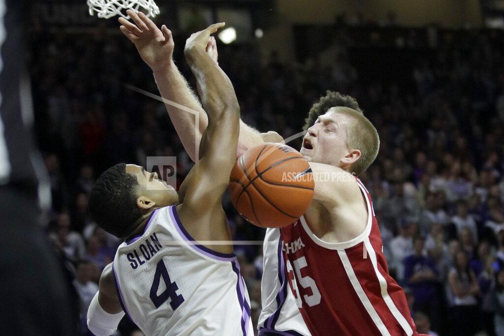 Orlin Wagner Oklahoma forward Brady Manek (35) and Kansas State guard David Sloan (4) collide during the first half of an NCAA college basketball game in Manhattan, Kan., Wednesday, Jan. 29, 2020. (AP Photo/Orlin Wagner)