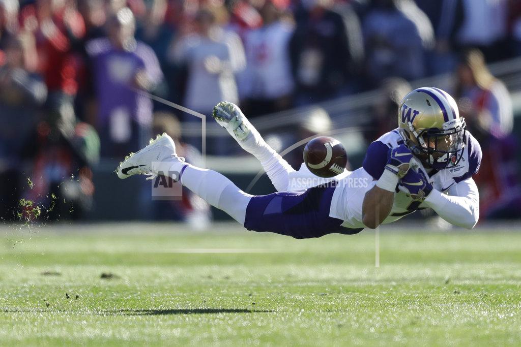 Marcio Jose Sanchez Washington wide receiver Andre Baccellia can't hang onto a pass during the first half of the Rose Bowl NCAA college football game against Ohio State, Tuesday, Jan. 1, 2019, in Pasadena, Calif. (AP Photo/Marcio Jose Sanchez)