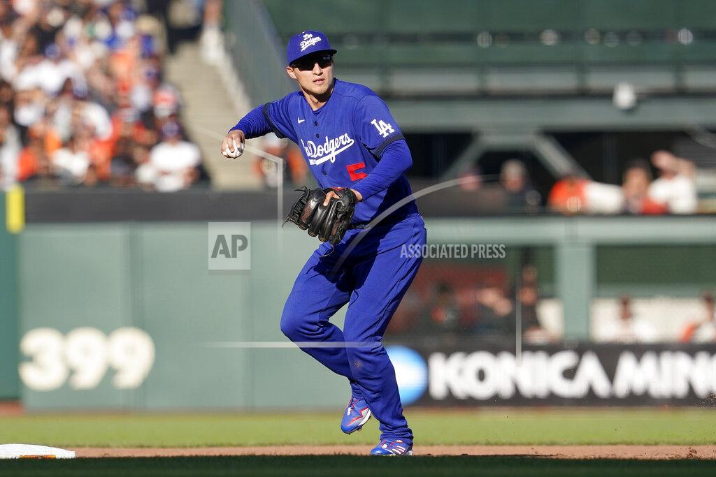 Jeff Chiu Los Angeles Dodgers' Corey Seager throws to first base on a double play hit into by San Francisco Giants' Brandon Belt during the fourth inning of a baseball game in San Francisco, Sunday, Sept. 5, 2021. (AP Photo/Jeff Chiu)