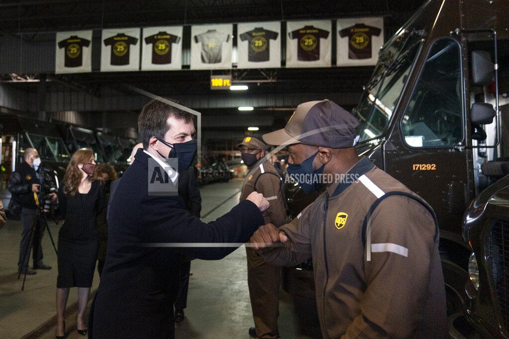 Carolyn Kaster Transportation Secretary Pete Buttigieg greets UPS driver Ricardo Adams during a tour of a UPS Facility in Landover, Md., Monday, March 15, 2021. Buttigieg was on hand to highlight COVID-19 vaccine distribution distribution efforts.(AP Photo/Carolyn Kaster)
