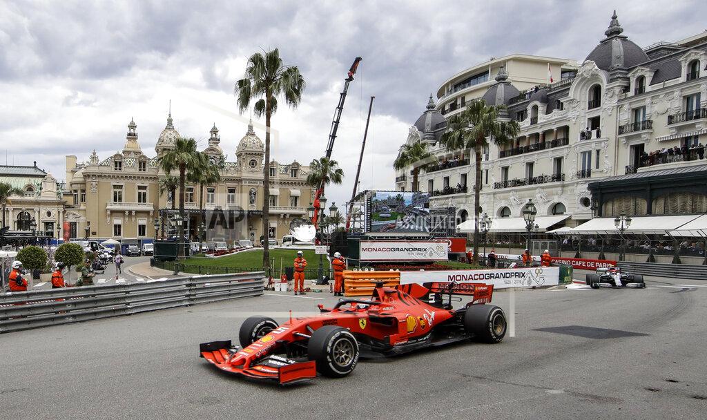 Luca Bruno Ferrari driver Sebastian Vettel of Germany steers his car during the Monaco Formula One Grand Prix race, at the Monaco racetrack, in Monaco, Sunday, May 26, 2019. (AP Photo/Luca Bruno)