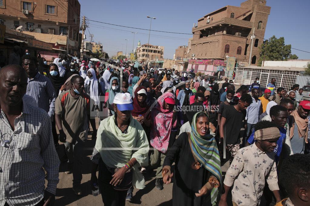 Marwan Ali Thousands of protesters take to the streets to renew their demand for a civilian government in the Sudanese capital Khartoum, Thursday, Nov. 25, 2021. The rallies came just days after the military signed a power-sharing deal with the prime minister, after releasing him from house arrest and reinstating him as head of government. The deal came almost a month after the generals orchestrated a coup. Sudan’s key pro-democracy groups and political parties have dismissed the deal as falling short of their demands for a fully civilian rule. (AP Photo/Marwan Ali)
