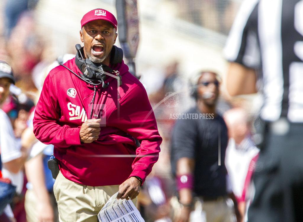 Mark Wallheiser FILE - In this Saturday, Oct. 27, 2018, file photo, Florida State head coach Willie Taggart disagrees with the referee during the first half of an NCAA college football game against Clemson in Tallahassee, Fla. Taggart's Seminoles are coming off a blowout home loss to No. 2 Clemson as they visit North Carolina State in Saturday. (AP Photo/Mark Wallheiser, File)