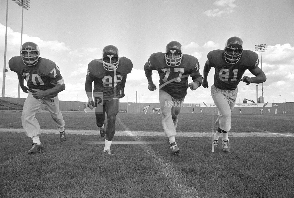 Anonymous FIEL- In this Sept. 16, 1971 , file photo, the powerful defensive front four of the Minnesota Vikings , from left, Jim Marshall, Alan Page, Gary Larson, Carl Eller pose during NFL football practiced in Minneapolis. Helmets have evolved from the original hard leather of the NFL’s infancy to hard polycarbonate single-piece shells with various amounts of padding and air bladders that served as the primary form of head protection into the beginning of this century. (AP Photo/File)