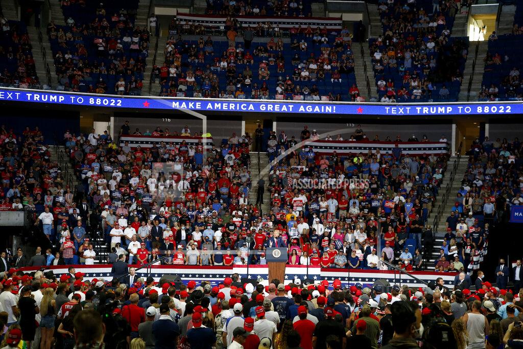 Sue Ogrocki President Donald Trump speaks during a campaign rally at the BOK Center, Saturday, June 20, 2020, in Tulsa, Okla. (AP Photo/Sue Ogrocki)