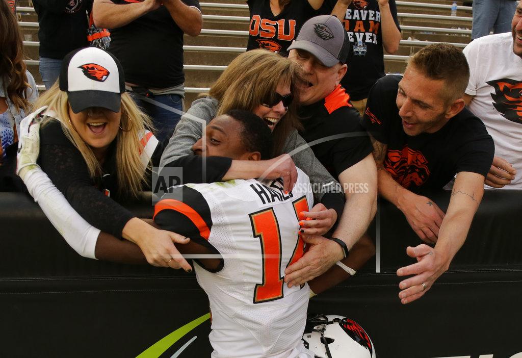Jack Dempsey Oregon State cornerback Kaleb Hayes is congratulated by fans after the team's overtime win against Colorado in an NCAA football game, Saturday, Oct. 27, 2018, in Boulder, Colo. (AP Photo/Jack Dempsey)