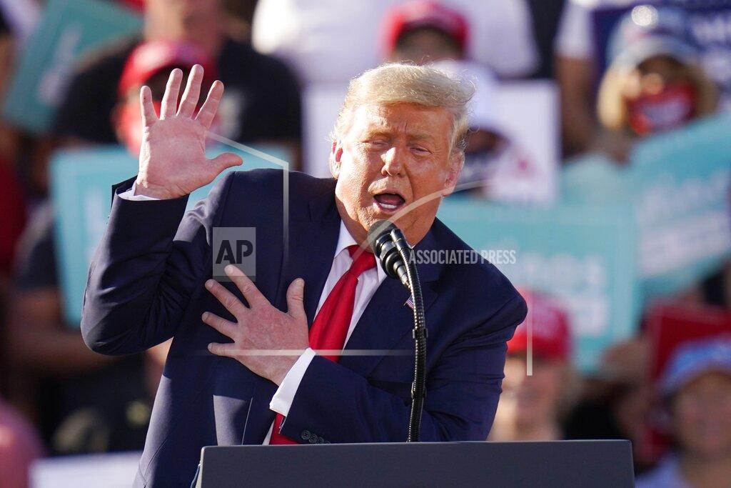 Ross D. Franklin President Donald Trump gestures as he talks about Democratic presidential candidate former Vice President Joe Biden as he speaks at a campaign rally Monday, Oct. 19, 2020, in Tucson, Ariz. (AP Photo/Ross D. Franklin)