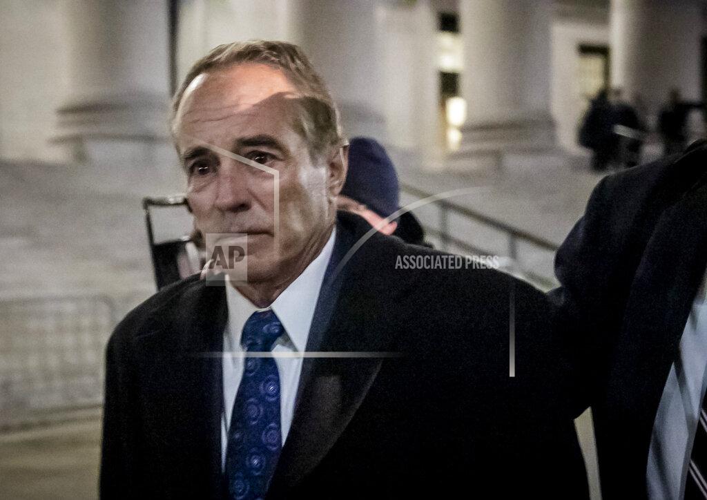 FILE- In this Jan. 17, 2020 file photo, former U.S. congressman Christopher Collins leaves federal court in New York after being sentenced to two years and two months for helping his son and others dodge $800,000 in stock market losses. The first member of Congress to endorse Donald Trump for president four years ago cited the coronavirus Thursday, Oct. 1, 2020, as he asked to delay serving his 26-month prison sentence. Collins was supposed to report to a federal prison camp in Pensacola, Florida, on Oct. 13 after pleading guilty last year to conspiracy to commit securities fraud and lying to law enforcement officials. (AP Photo/Bebeto Matthews, File)
