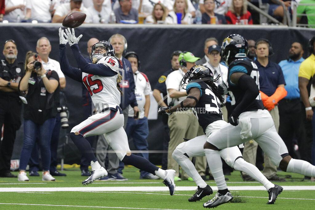 David J. Phillip Houston Texans wide receiver Will Fuller (15) pulls in a pass against the Jacksonville Jaguars during the first half of an NFL football game Sunday, Sept. 15, 2019, in Houston. (AP Photo/David J. Phillip)