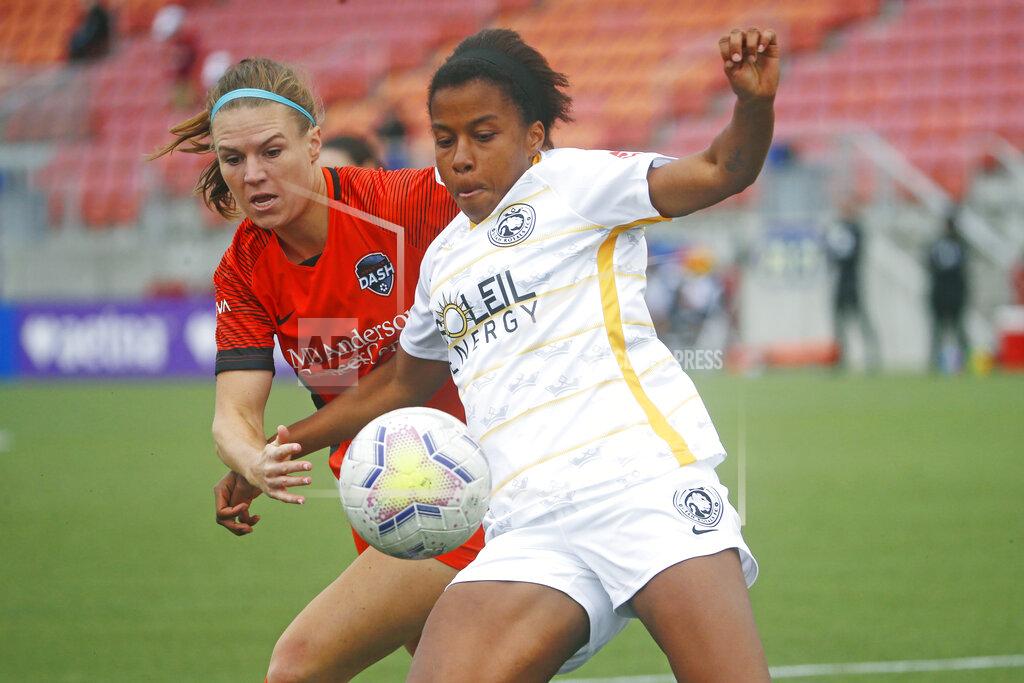 Rick Bowmer Utah Royals FC defender Elizabeth Ball, right, battles with Houston Dash forward Veronica Latsko for the ball during the first half of an NWSL Challenge Cup soccer match at Zions Bank Stadium Tuesday, June 30, 2020, in Herriman, Utah. (AP Photo/Rick Bowmer)