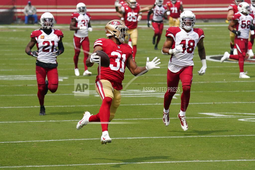 Tony Avelar San Francisco 49ers running back Raheem Mostert (31) runs toward the end zone to score a touchdown against the Arizona Cardinals during the first half of an NFL football game in Santa Clara, Calif., Sunday, Sept. 13, 2020. (AP Photo/Tony Avelar)