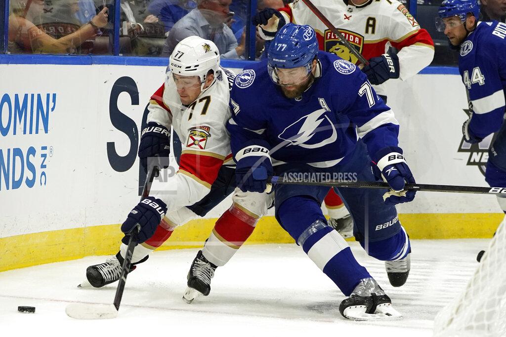Chris O'MEara Florida Panthers left wing Frank Vatrano, left, tries to move around Tampa Bay Lightning defenseman Victor Hedman during the first period of an NHL hockey game Tuesday, Oct. 19, 2021, in Tampa, Fla. (AP Photo/Chris O'Meara)