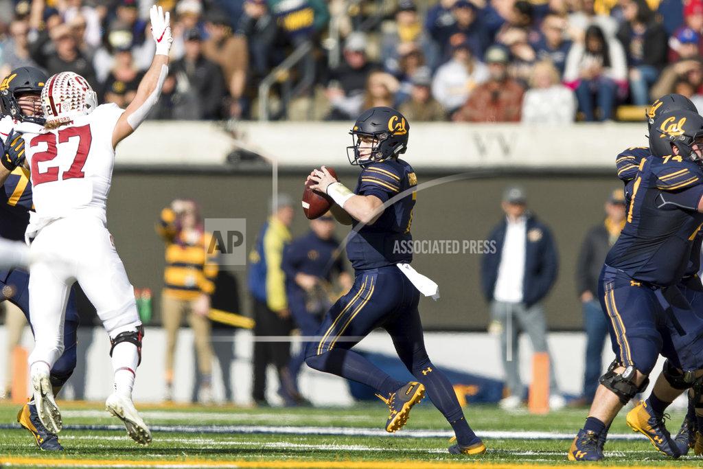 John Hefti California quarterback Chase Garbers runs the ball against Stanford in the first quarter of a football game in Berkeley, Calif., Saturday, Dec. 1, 2018. (AP Photo/John Hefti)
