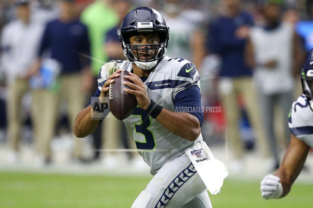 Ross D. Franklin Seattle Seahawks quarterback Russell Wilson (3) looks to throw against the Arizona Cardinals during the second half of an NFL football game, Sunday, Sept. 29, 2019, in Glendale, Ariz. (AP Photo/Ross D. Franklin)