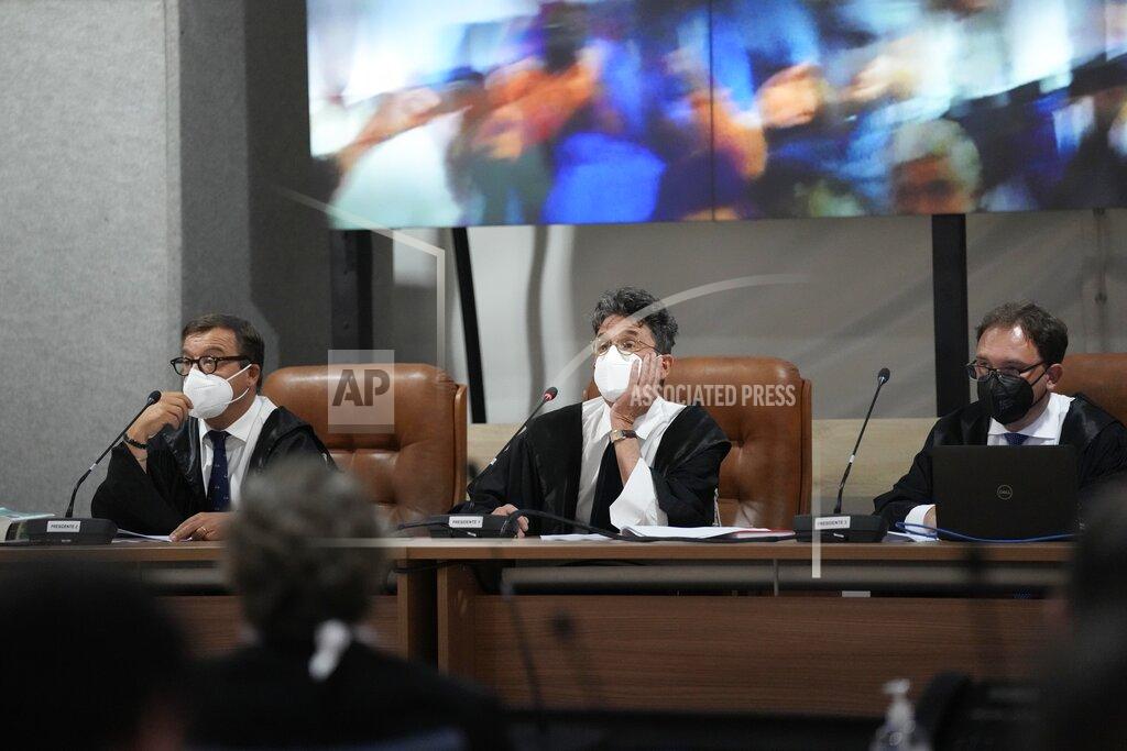 Antonio Calanni Judge Paolo Lepri, center, gestures during the first hearing of the trial for the Morandi bridge collapse at the Genoa's Palace of Justice Thursday, July 7, 2022. Forty-three people were killed when a large stretch of the Morandi Bridge broke off, August 14, 2018, on the eve of one of Italy's biggest vacation holidays. (AP Photo/Antonio Calanni)