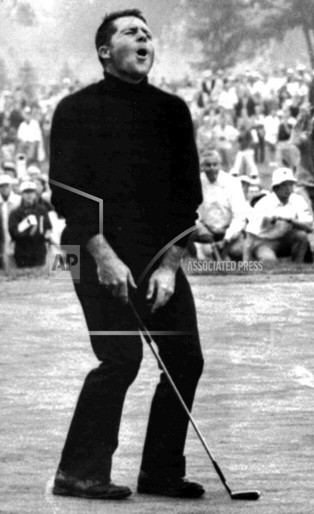 Uncredited FILE - South Africa's Gary Player throws his head in the air after putting on the eighteenth hole, where he won the PGA Championship, at Oakland Hill, in Birmingham, Mich., Aug. 6, 1972. This is the 50-year anniversary of his second PGA title. (AP Photo, File)