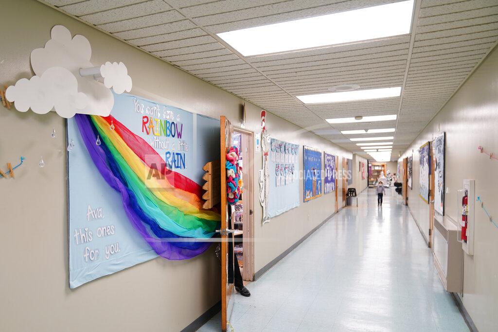 Matt Slocum A memorial dedicated to former student Ava Lerario is posted in a hallway at Panther Valley Elementary School, Thursday, March 11, 2021, in Nesquehoning, Pa. On May 26, 2020, former student, 9-year-old Ava Lerario; her mother, Ashley Belson, and Ava's father, Marc Lerario, were found fatally shot inside their home. (AP Photo/Matt Slocum)
