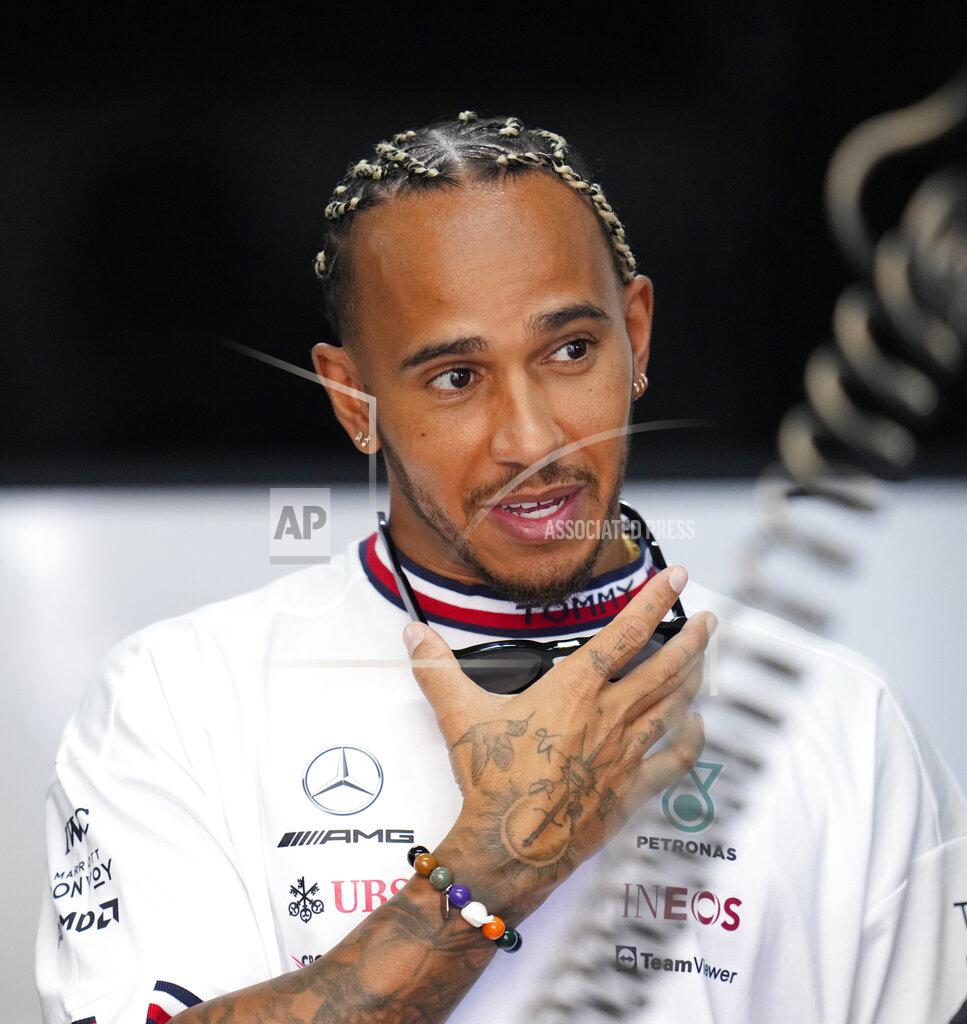 Manu Fernandez Mercedes driver Lewis Hamilton, of Britain, arrives at pit prior to the start of the first practice for the French Formula One Grand Prix at Paul Ricard racetrack in Le Castellet, southern France, Friday, July 22, 2022. The French Grand Prix will be held on Sunday. (AP Photo/Manu Fernandez)