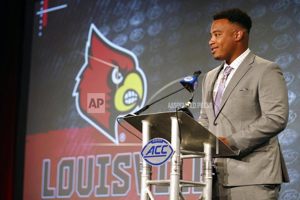 Nell Redmond Louisville offensive guard Caleb Chandler answers a question at the NCAA college football Atlantic Coast Conference Media Days in Charlotte, N.C., Wednesday, July 20, 2022. (AP Photo/Nell Redmond)