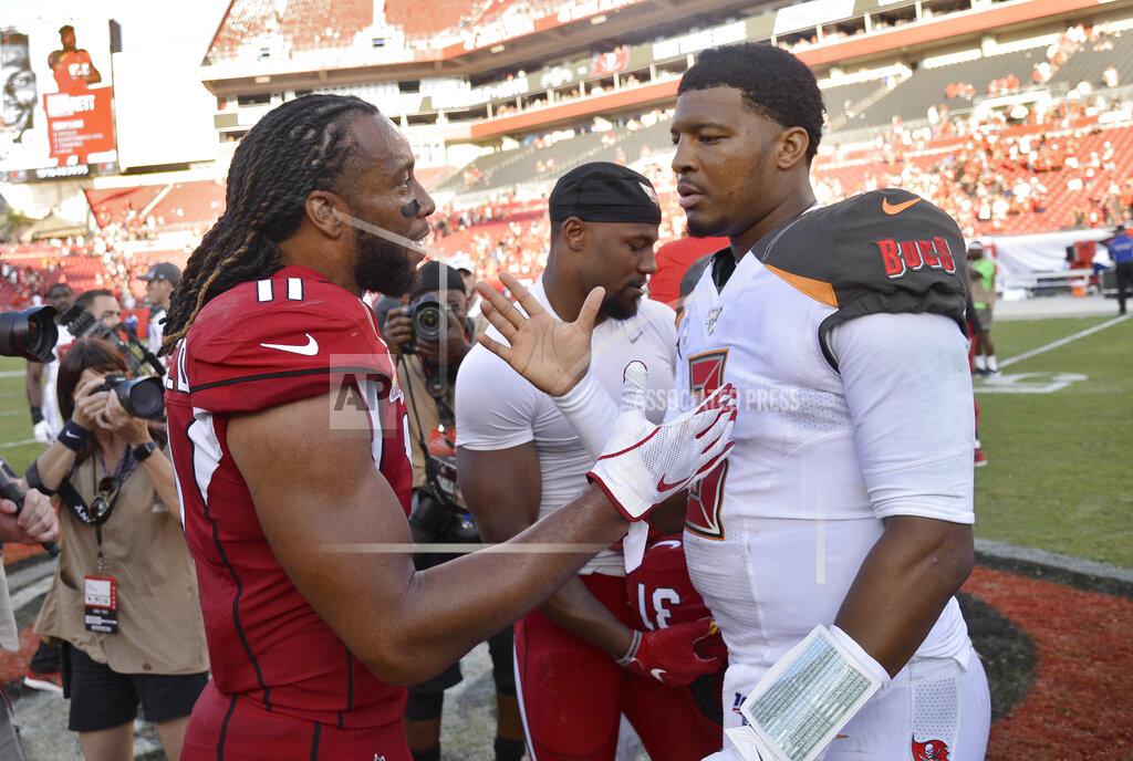 Jason Behnken Arizona Cardinals wide receiver Larry Fitzgerald (11) shakes hands with Tampa Bay Buccaneers quarterback Jameis Winston (3) after an NFL football game Sunday, Nov. 10, 2019, in Tampa, Fla. (AP Photo/Jason Behnken)