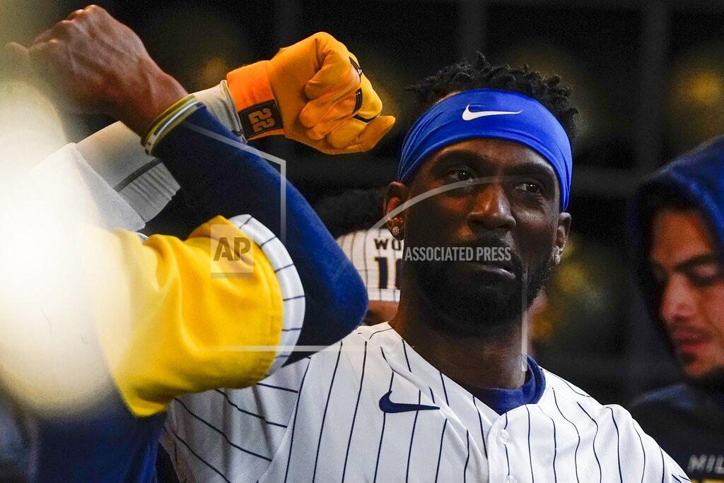 Morry Gash Milwaukee Brewers' Andrew McCutchen is congratulated after hitting a home run during the first inning of a baseball game against the Washington Nationals Saturday, May 21, 2022, in Milwaukee. (AP Photo/Morry Gash)