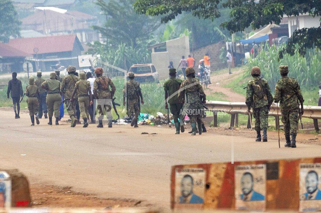 Jerome Delay Ugandan security forces patrol Kampala, Uganda, Saturday Jan. 16, 2021, after Ugandan President Yoweri Kaguta Museveni was declared winner of the presidential elections. Uganda’s electoral commission says longtime President Yoweri Museveni has won a sixth term, while top opposition challenger Bobi Wine alleges rigging and officials struggle to explain how polling results were compiled amid an internet blackout. In a generational clash widely watched across the African continent, the young singer-turned-lawmaker Wine posed arguably the greatest challenge yet to Museveni. (AP Photo/Jerome Delay)
