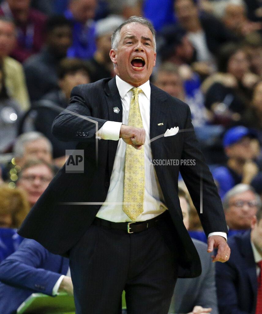 Stephen B. Morton Wofford coach Mike Young shouts to his players during the first half against Seton Hall in a first-round game in the NCAA men’s college basketball tournament in Jacksonville, Fla., Thursday, March 21, 2019. (AP Photo/Stephen B. Morton)